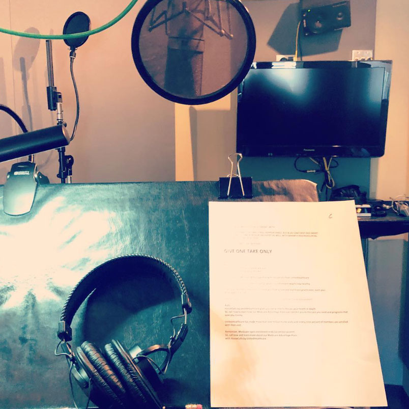Script, headphones and microphone set up in Bill Stage's voice over studio for a long narration session