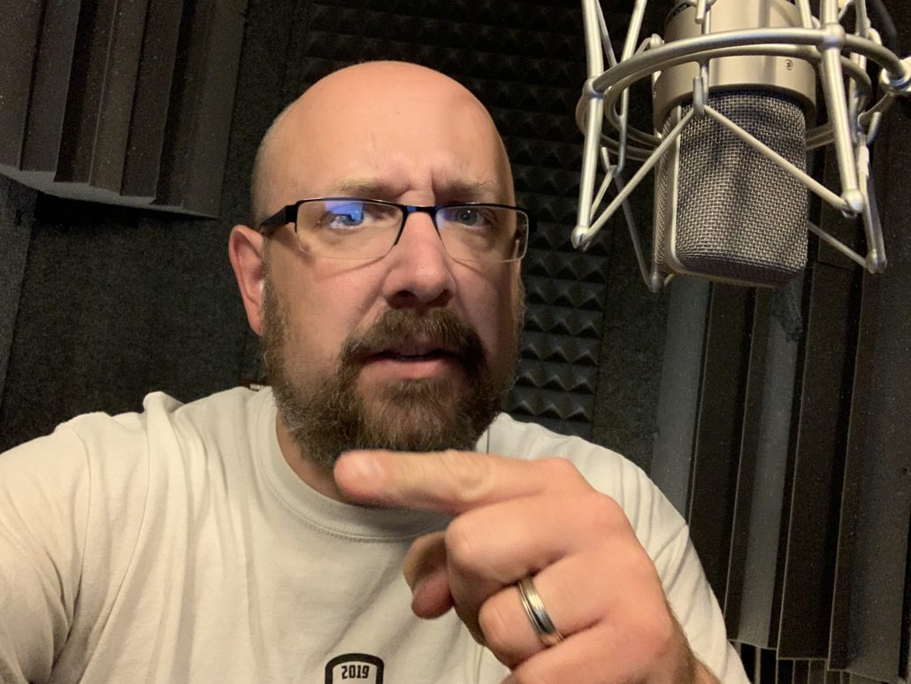 Bill Stage talking straight to camera in his voice over booth, the direct read social video ads need