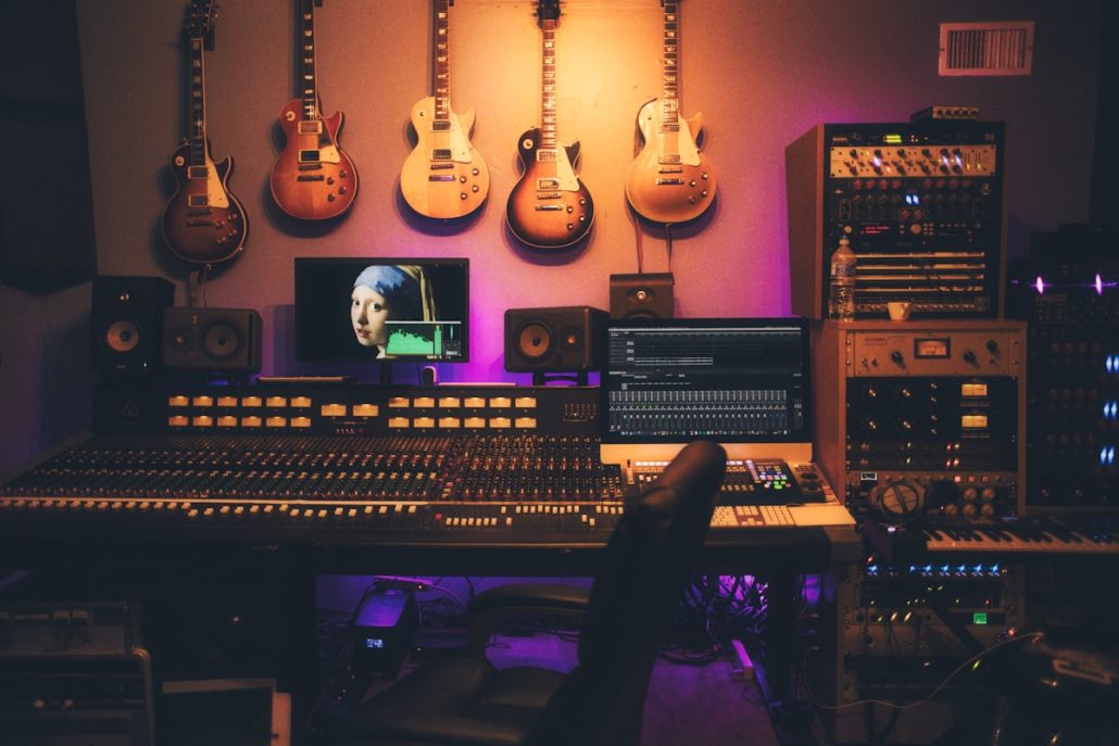 Professional condenser microphone in a recording studio booth