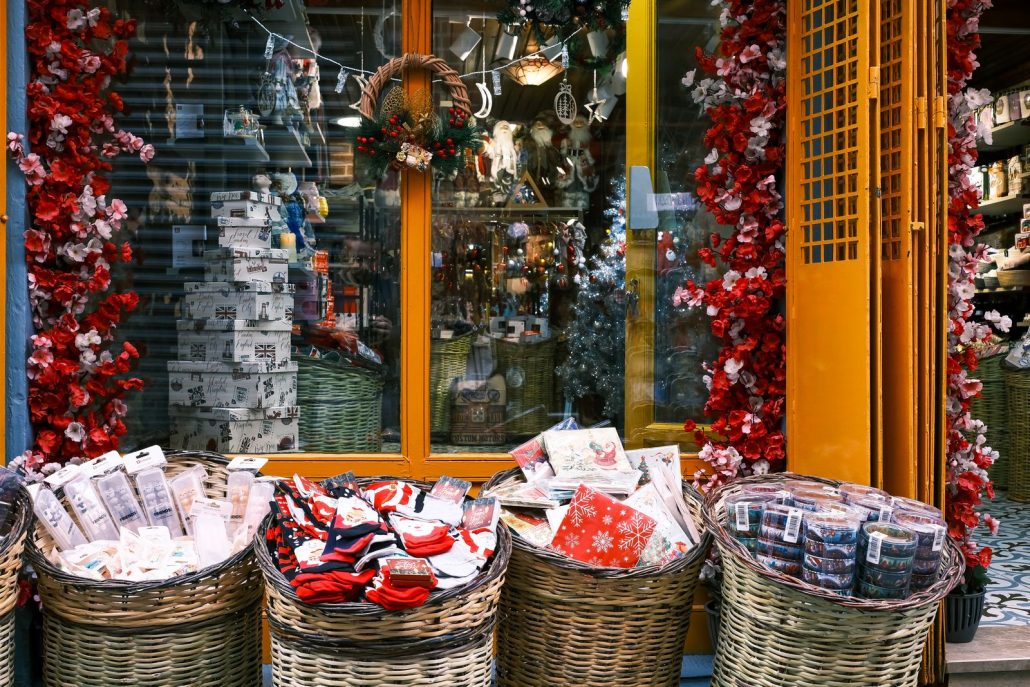 Holiday shoppers in a decorated store, the audience a holiday commercial voice over has to reach before the big day