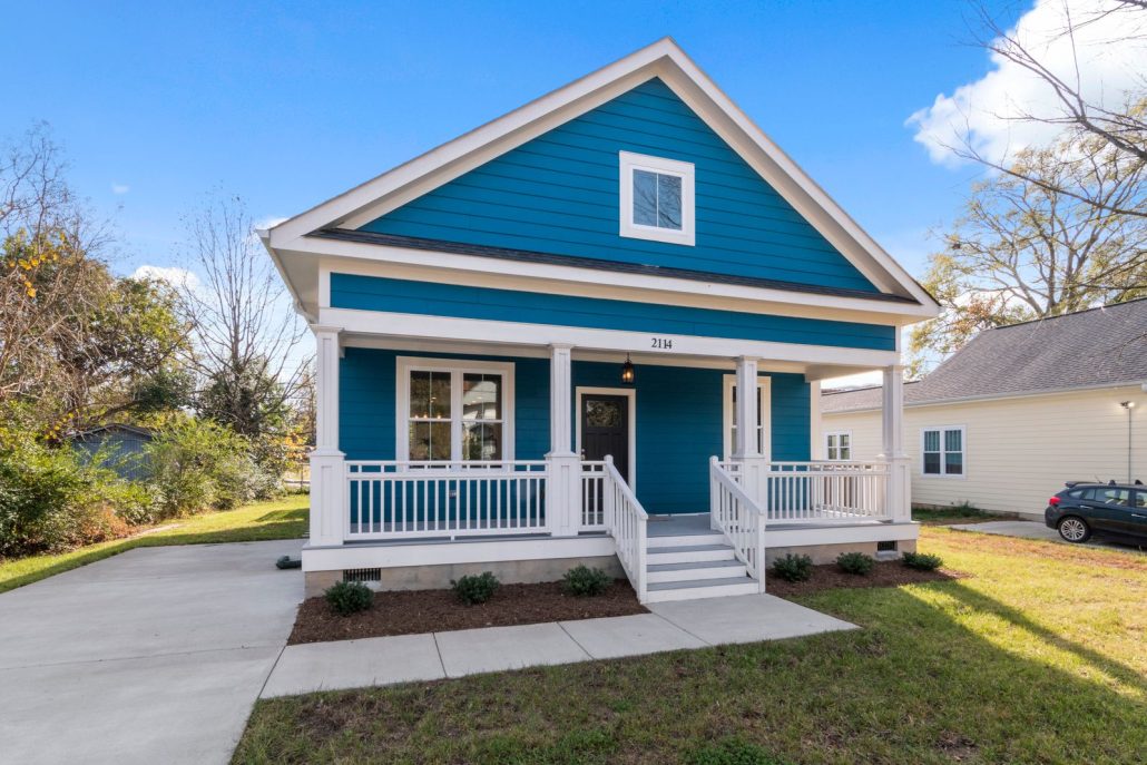 Small-town house with a front porch, the kind of home voice over for real estate listing videos should tell the story of